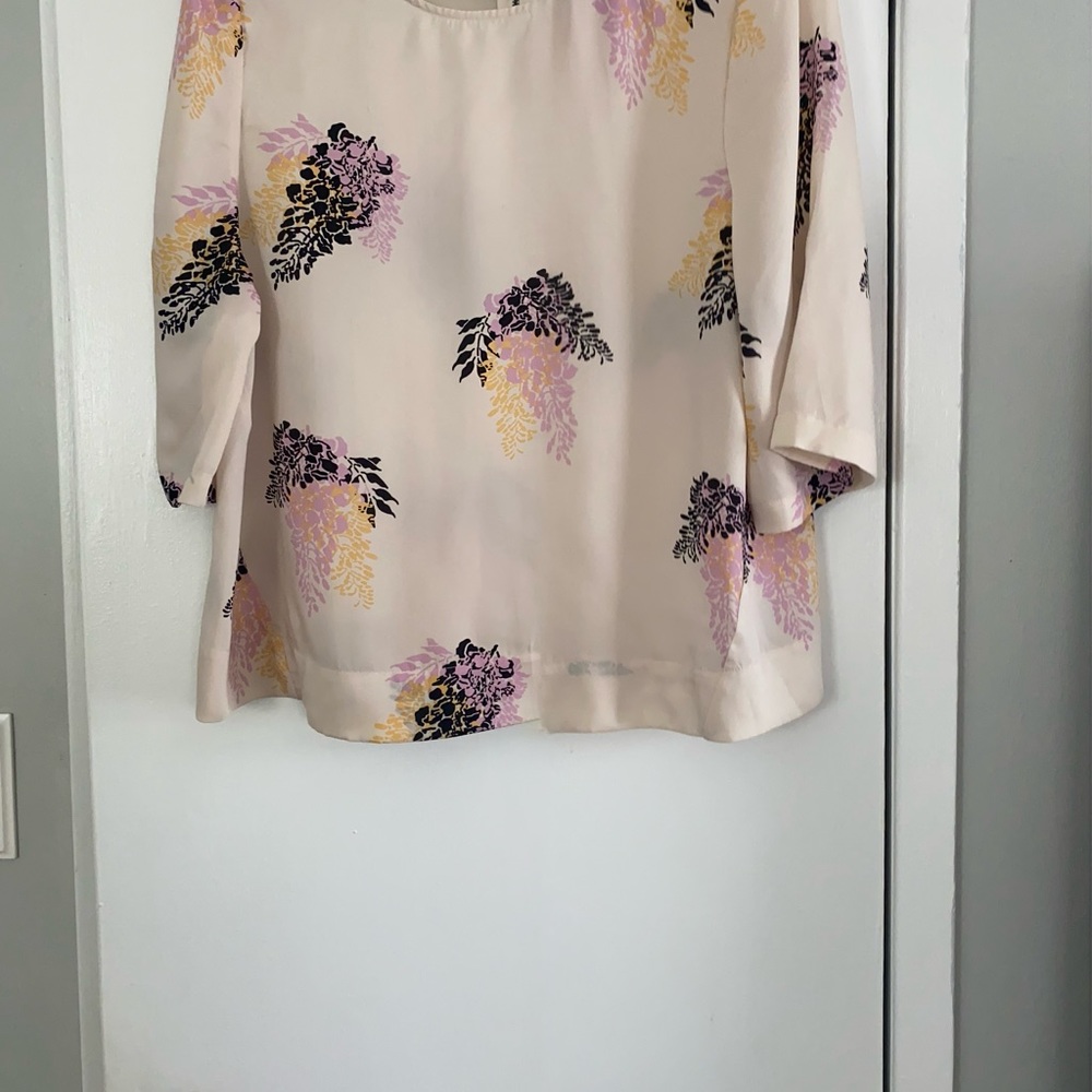 Cream blouse with pink, yellow and black flowers. DKNy. Size m
